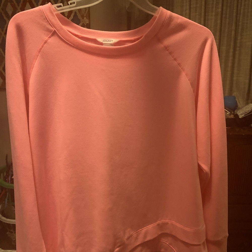 Pink Jockey pullover/ uneven front drop hems.
